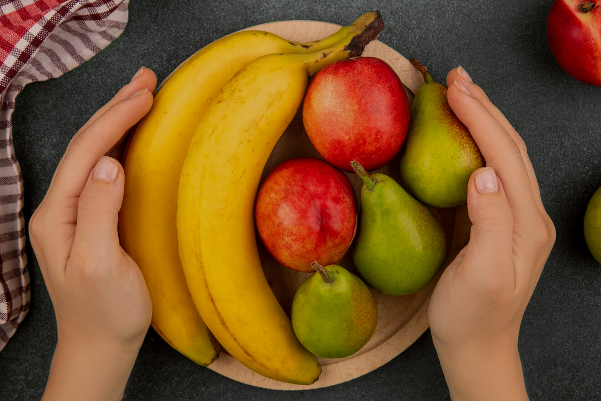 apples and bananas on the dinner table